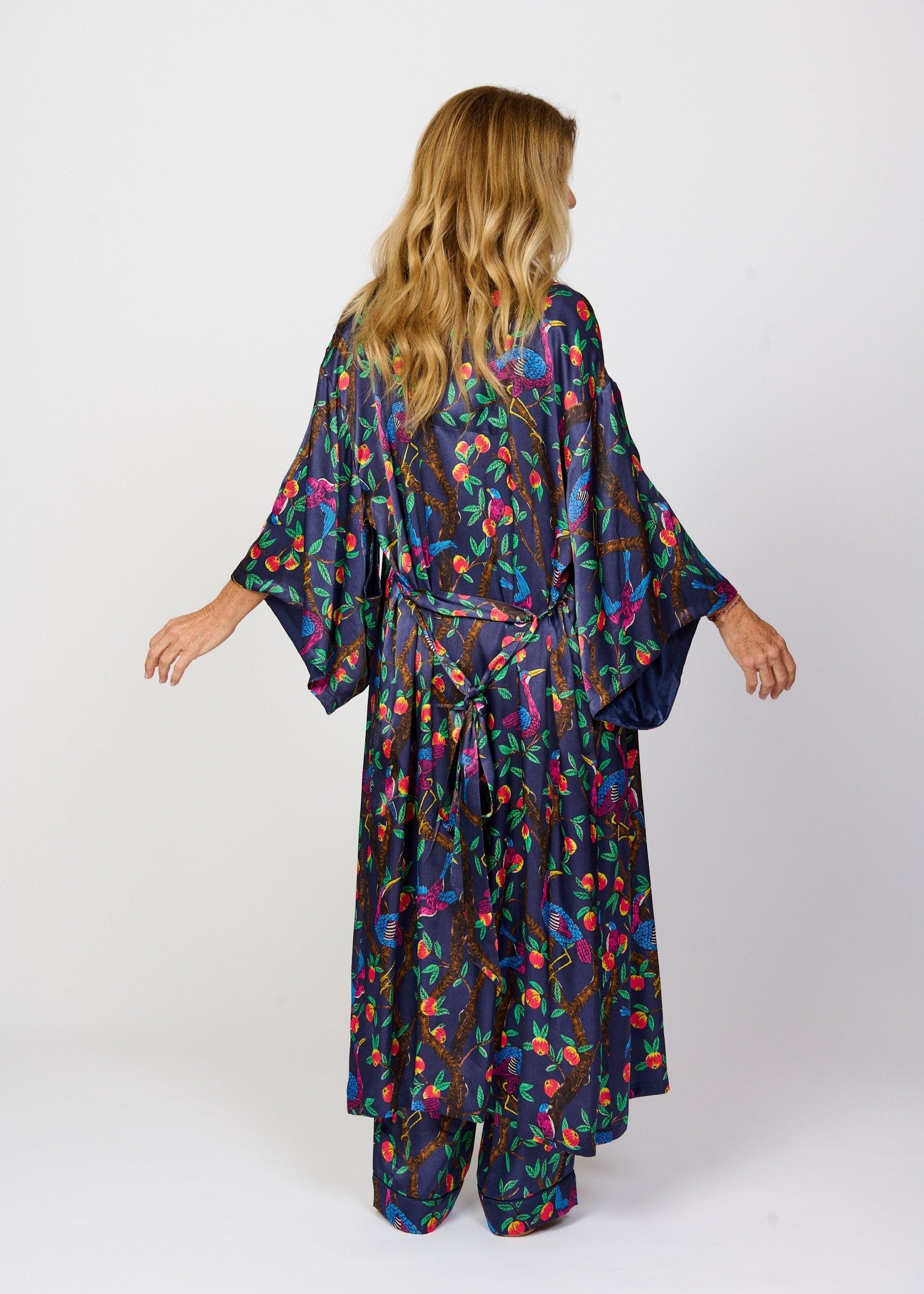 Brightly colour tropical bird and foliage print - silky feel kimono robe - back view - shown with matching pyjama pants