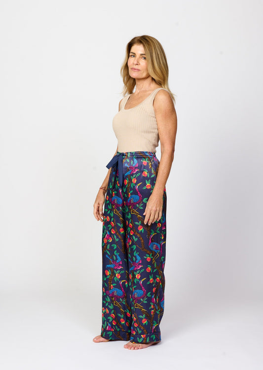 Brightly colour tropical bird and foliage print - silky feel pyjama pants - front side view