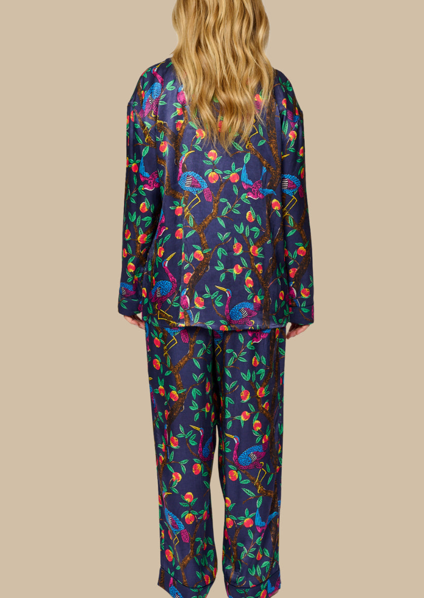 Brightly colour tropical bird and foliage print - silky feel pyjama set - full length back view with matching pants