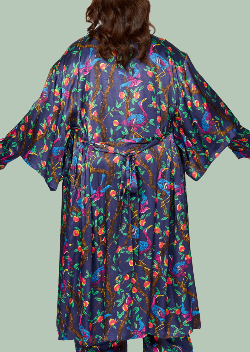 Brightly colour tropical bird and foliage print - silky feel kimono robe - back view - arms out - shown with matching pyjama pants